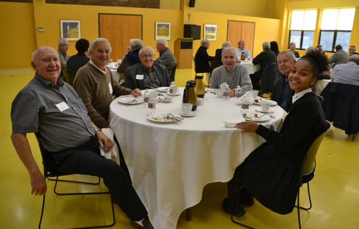 Members of the Cretin Class of 1954 enjoy lunch with Cretin-Derham Hall students